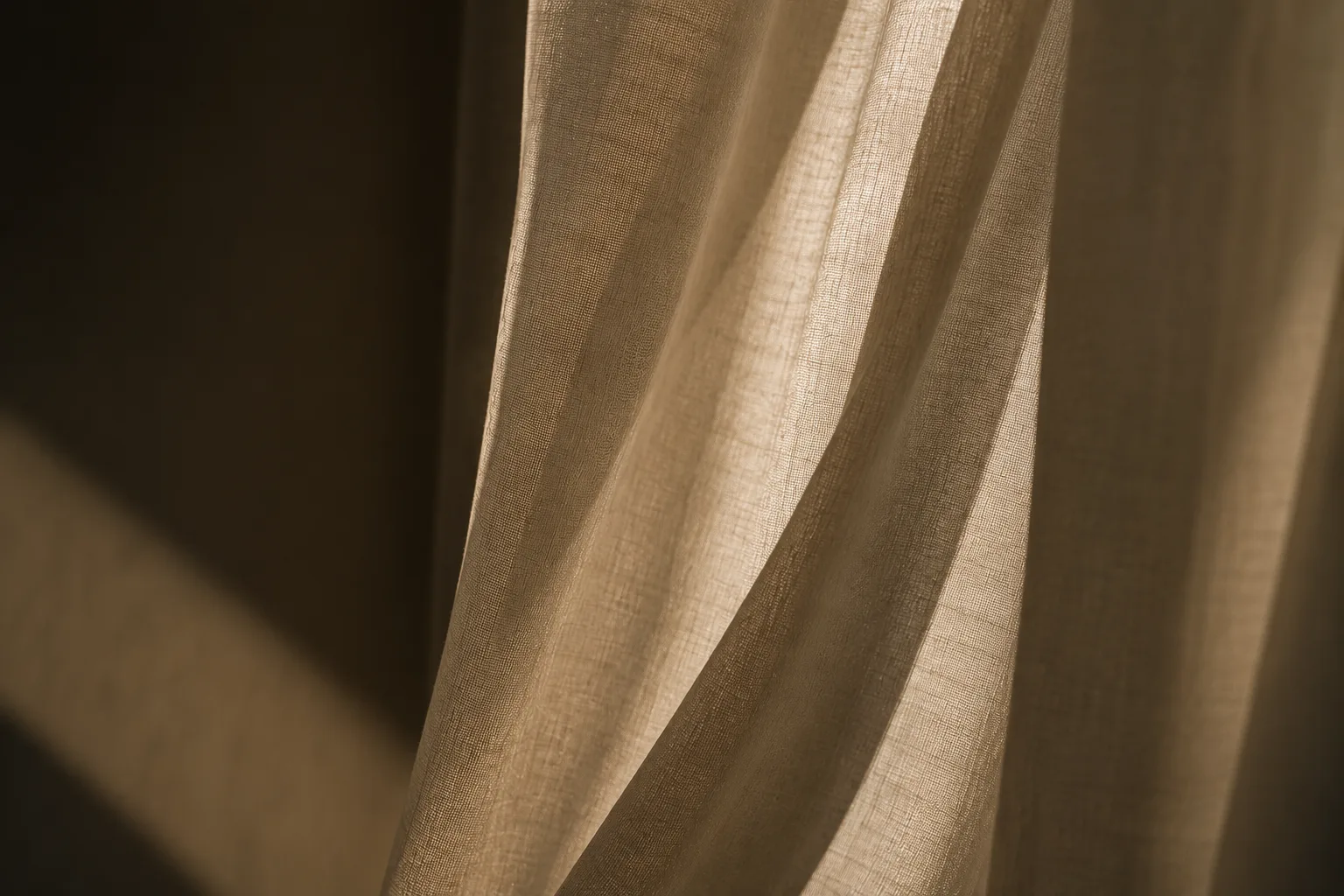 Linen curtain in a play of light