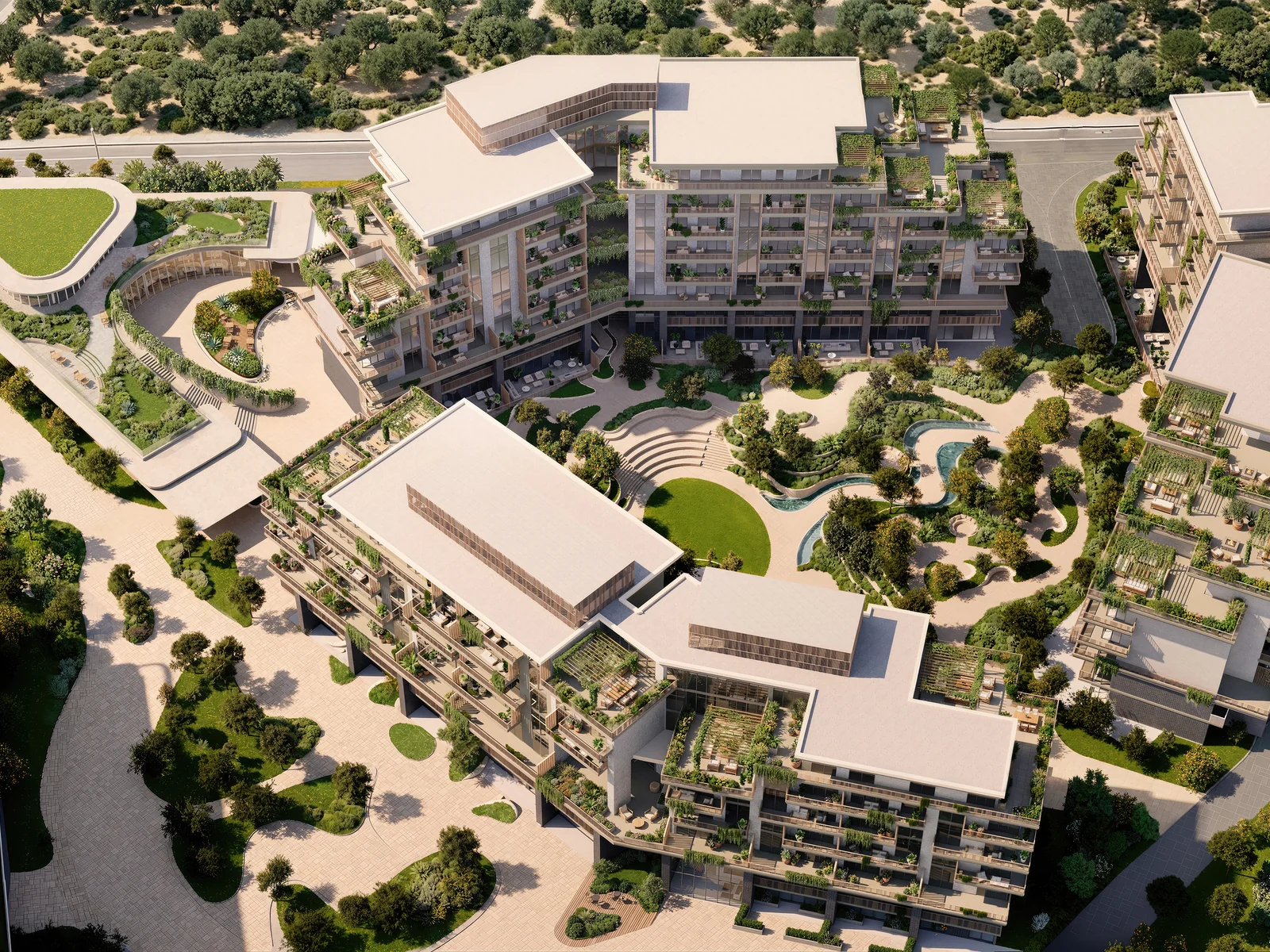 Arancia Yards, aerial view of the low-rise ensemble with green courtyards in City of Arabia