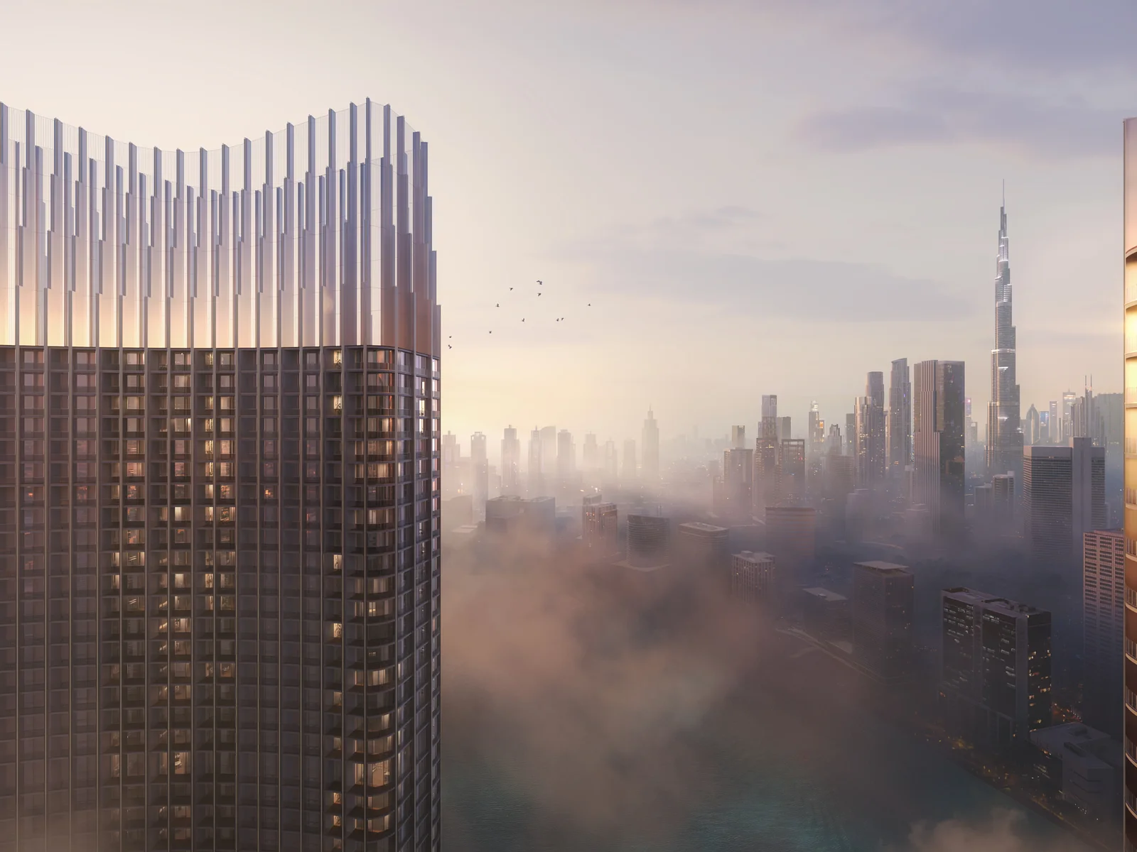 Binghatti Skyrise, Turmkronen &uuml;ber Nebel mit Burj Khalifa in der Ferne